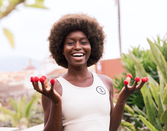 A photo of a smiling woman.