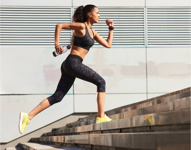 A photo of a woman running.