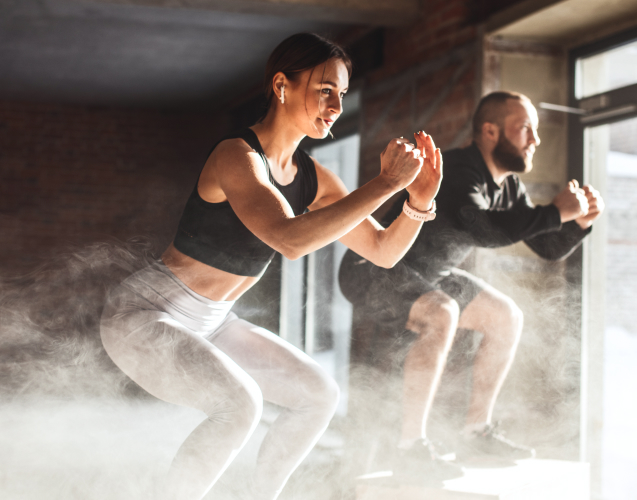 A photo of a woman and a man doing sports.