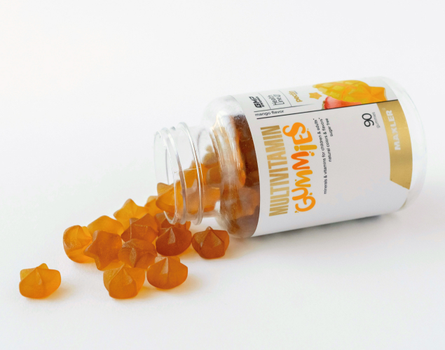 A photo of an open Multivitamin Gummies bottle.