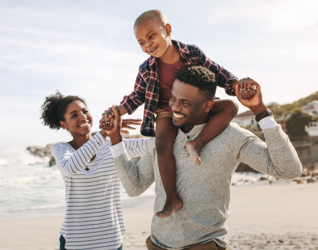 A photo of smiling family.